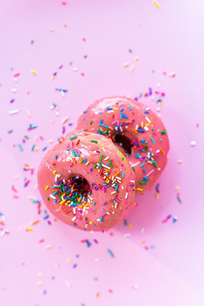 Vegan strawberry frosted donut with rainbow sprinkles at Spiral Diner Fort Worth